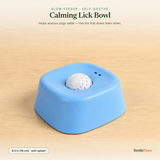 Soft-blue dog calming lick bowl with a white frosted rolling ball and anti-splash walls